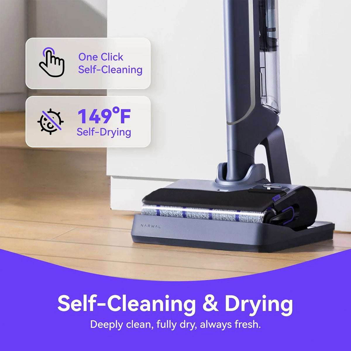 Vacuum cleaner with self-cleaning and drying features on a wooden floor. Vacuum cleaner with self-cleaning and drying features on a wooden floor.