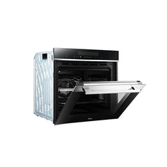 Black oven with open door on a white background