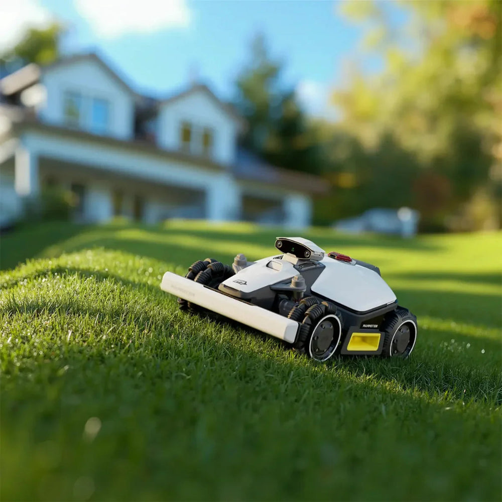 Robotic lawn mower on a grassy lawn with a blurred house and trees in the background Robotic lawn mower on a grassy lawn with a blurred house and trees in the background